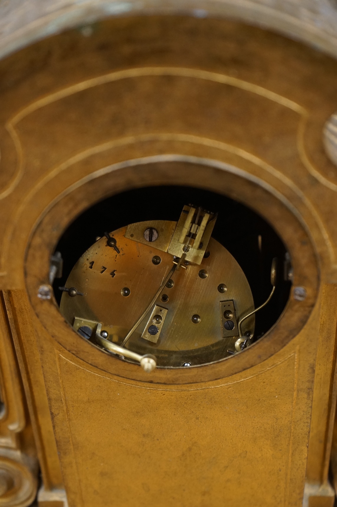 A French gilt metal and champleve enamel clock, 41cm